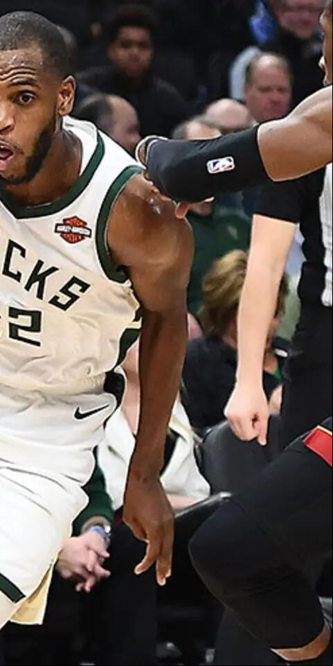 Khris Middleton #22 of the Milwaukee Bucks drives around Josh Richardson #0 of the Miami Heat during a game at Fiserv Forum on January 15, 2019 in Milwaukee, Wisconsin