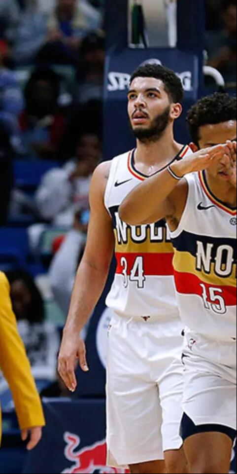 Frank Jackson #15 of the New Orleans Pelicans, Jahlil Okafor #8, Darius Miller #21, Kenrich Williams #34 and Jrue Holiday #11 react during a game against the Denver Nuggets at the Smoothie King Center on January 30, 2019