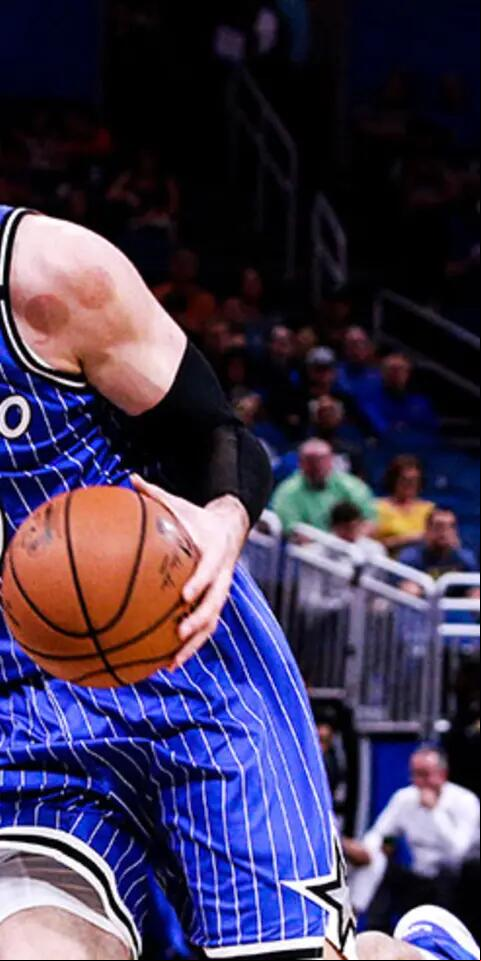 Nikola Vucevic of the Orlando Magic charges up the court against Robin Lopez #42 of the Chicago Bulls in the first quarter at Amway Center on February 22, 2019 in Orlando, Florida